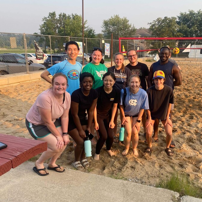 GRE Lab members playing sand volleyball